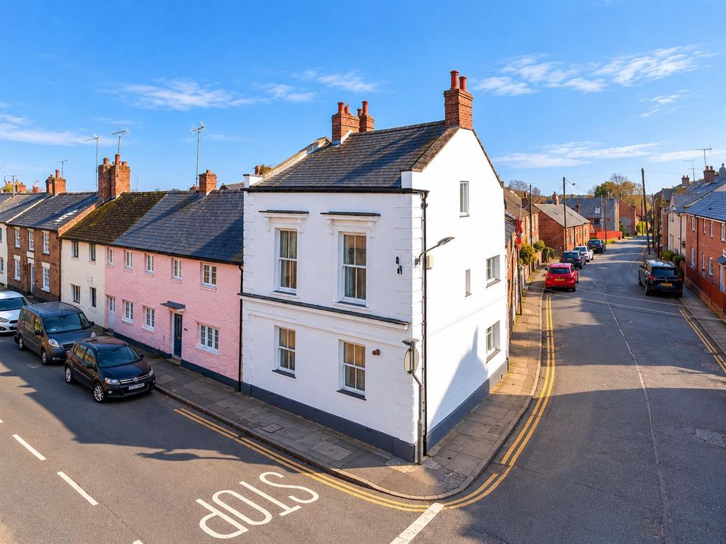 Property photo 1 of 21 Aerial View Of A Sunny Terraced Street Corner (1).