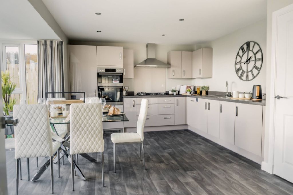 Property photo 3 of 10 Dining And Kitchen Area