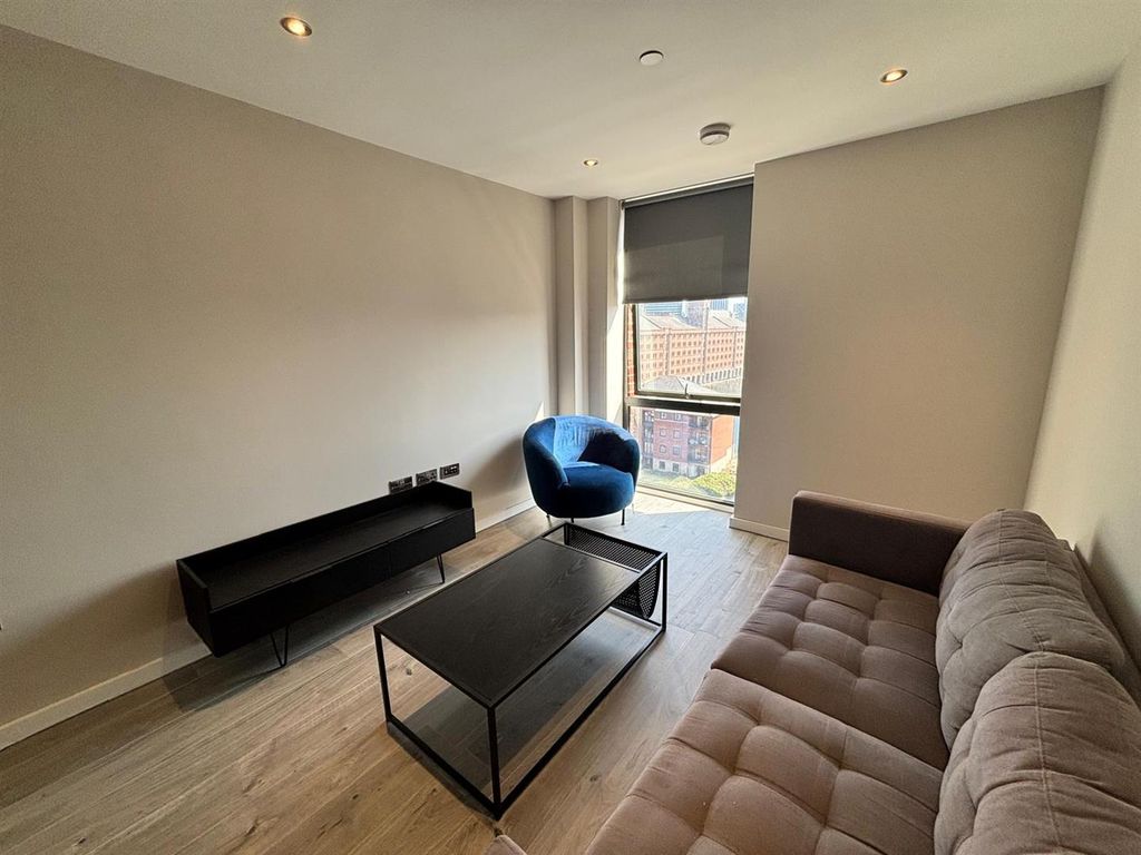 Property photo 2 of 9 702 - Living Room 2.Png