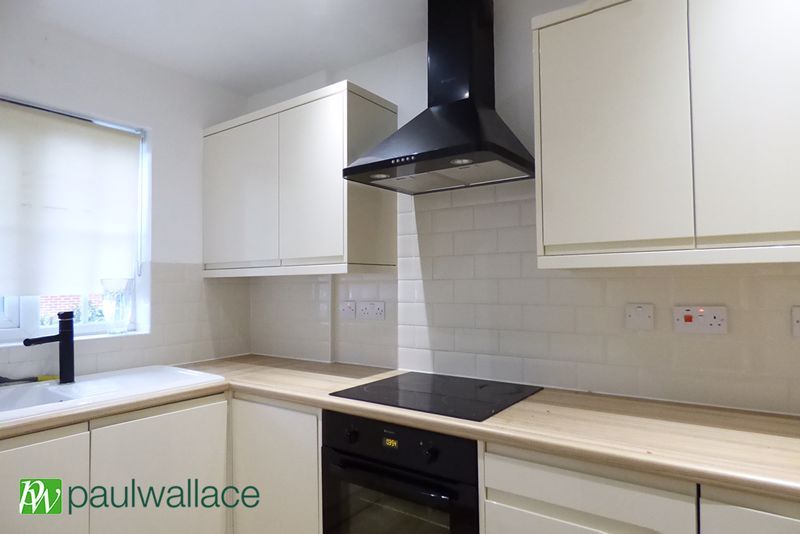 Property photo 3 of 8 Kitchen