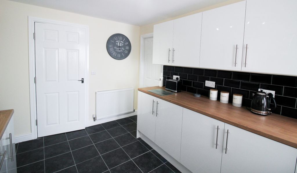 Property photo 1 of 12 Kitchen