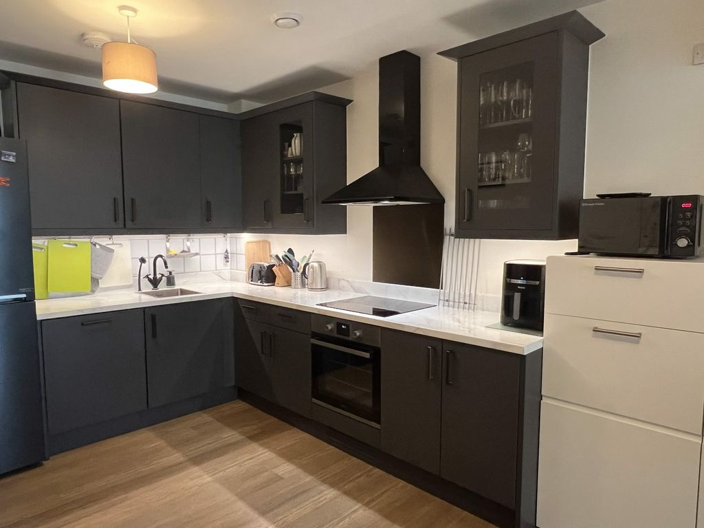 Property photo 2 of 12 Kitchen