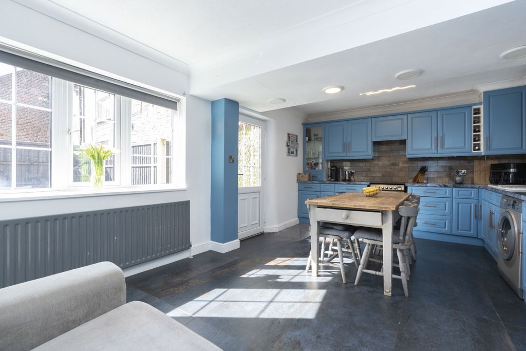 Property photo 2 of 19 Dining Area And Kitchen
