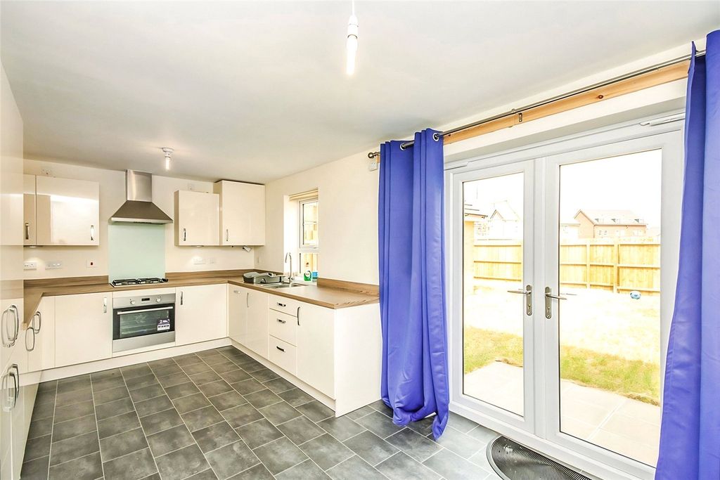 Property photo 2 of 8 Dining Kitchen