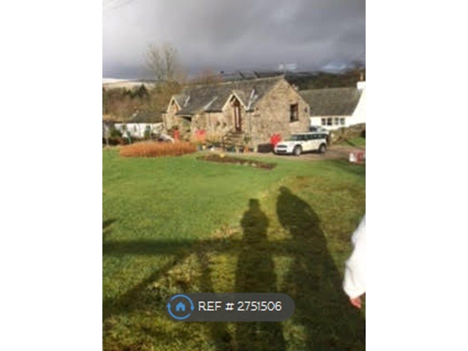 Property photo 2 of 8 Side View