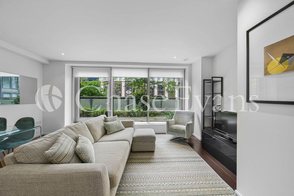 Property photo 3 of 12 Living Area