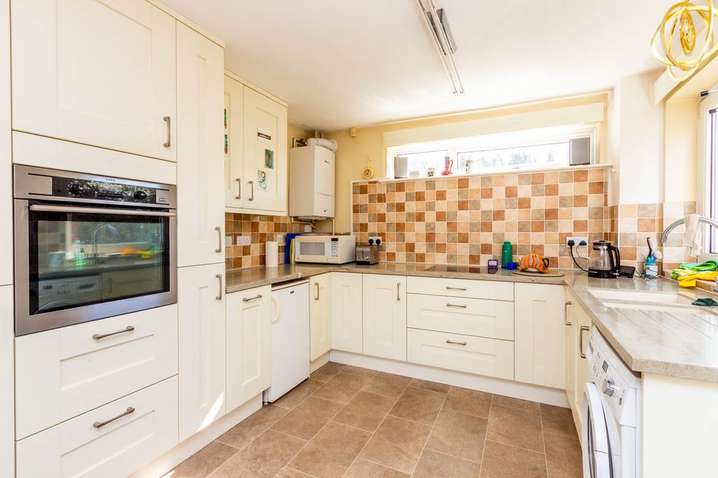Property photo 3 of 14 Kitchen Area