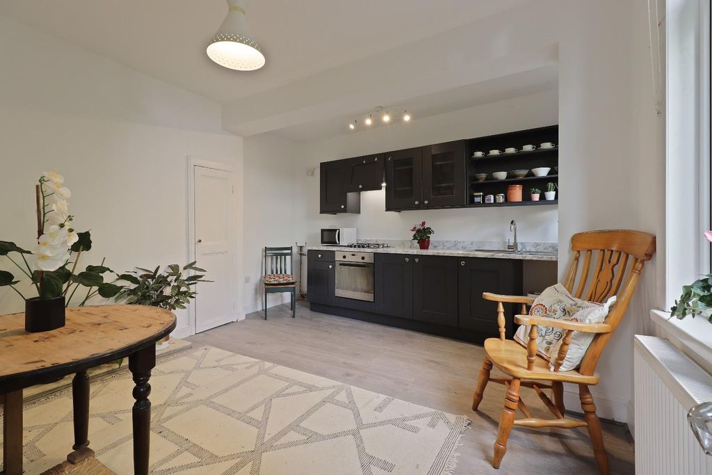 Property photo 2 of 17 Dining Kitchen