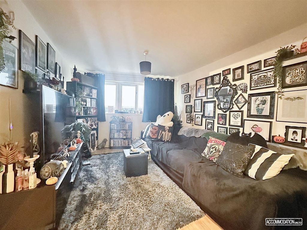 Property photo 3 of 13 Spacious Lounge With Large Sofa And Natural Light...