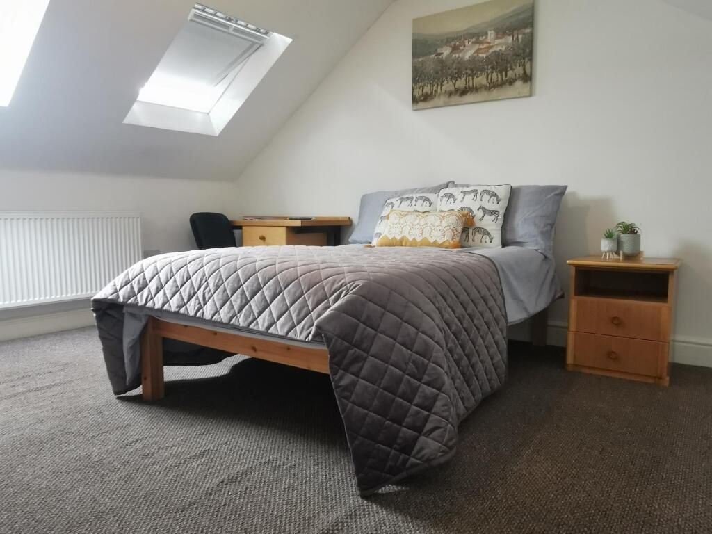 Property photo 1 of 7 Bright Attic Bedroom With Cozy Double Bed...