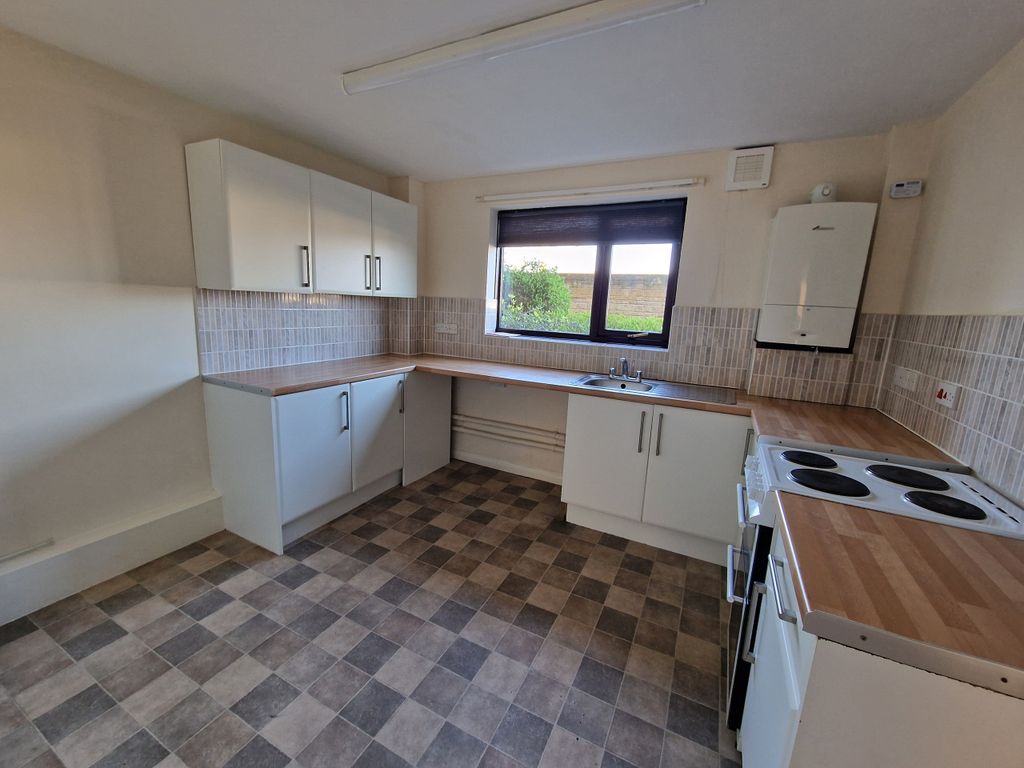 Property photo 3 of 9 Kitchen