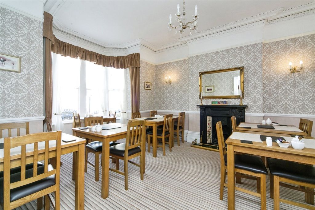 Property photo 3 of 16 Dining Room