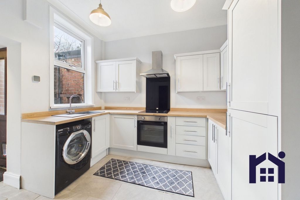 Property photo 3 of 13 Kitchen