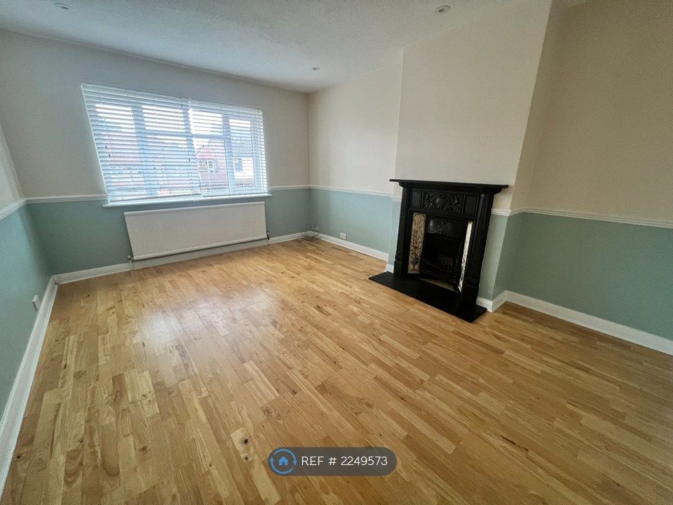 Property photo 2 of 7 Living Room With A Feature Fire Place
