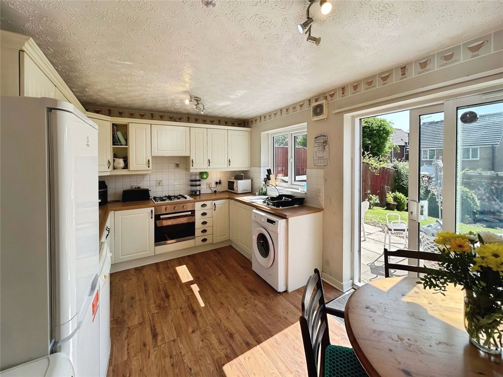 Property photo 2 of 17 Dining Kitchen