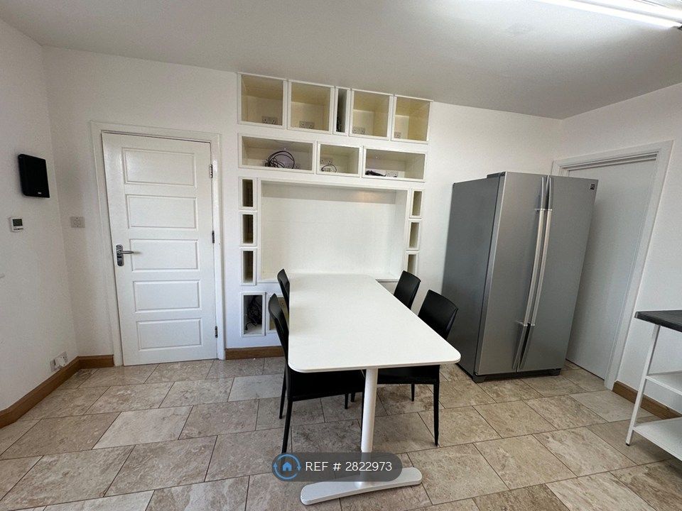 Property photo 3 of 9 Dinging Area With American Fridge