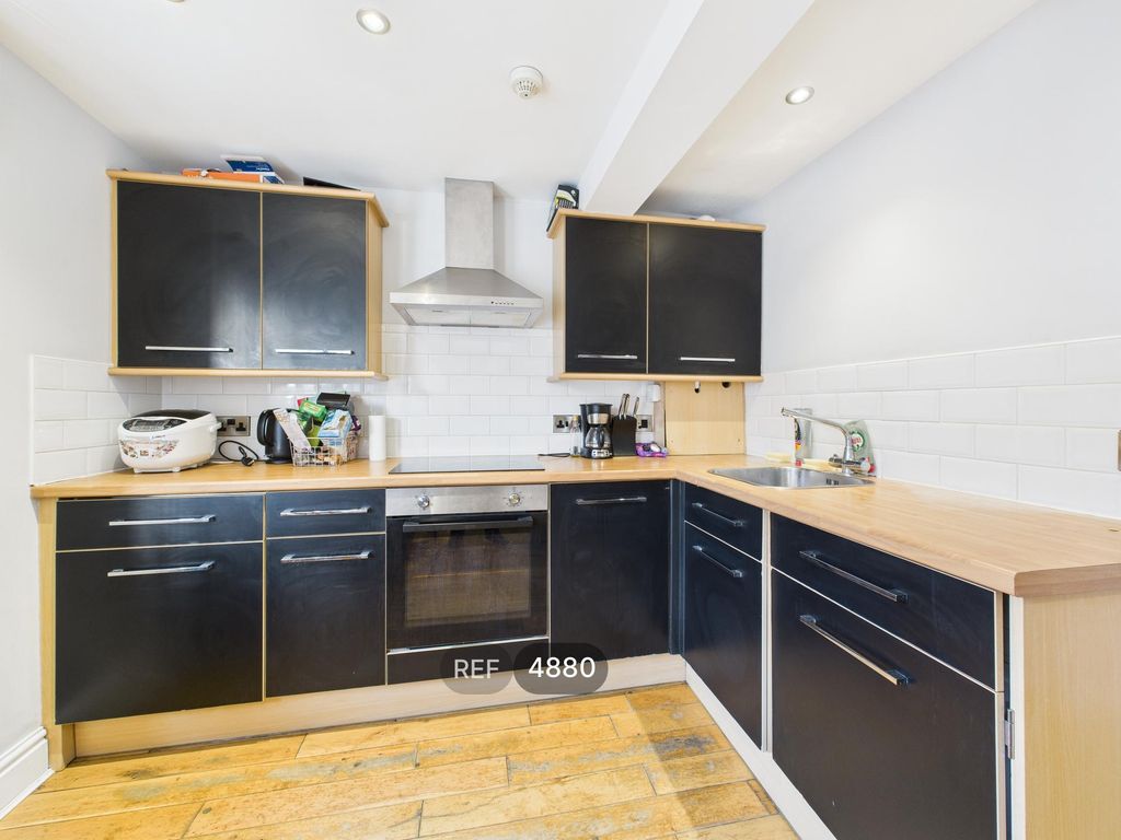 Property photo 2 of 13 Kitchen / Living Area