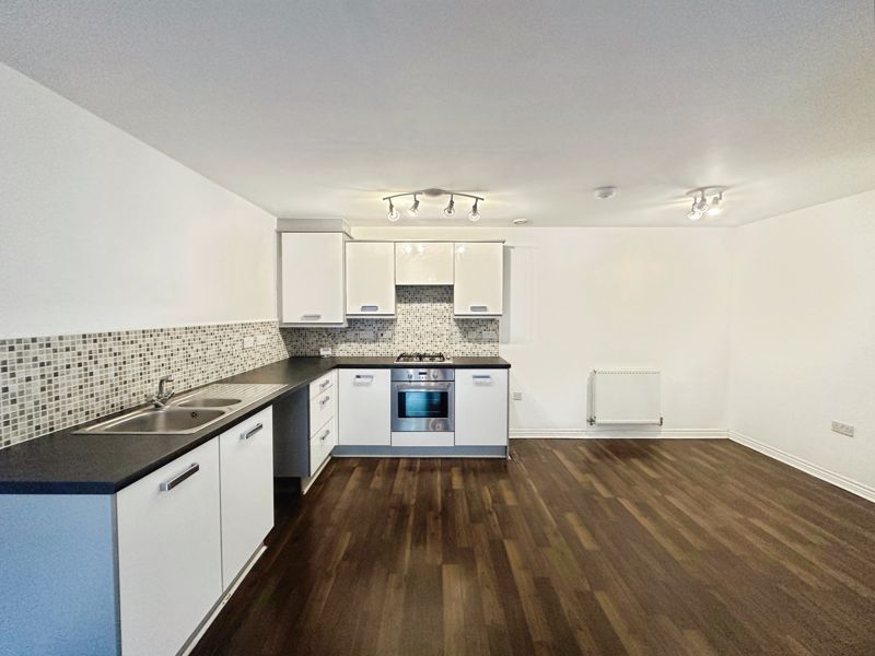 Property photo 3 of 8 Kitchen