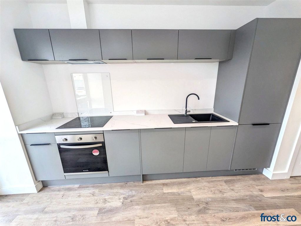 Property photo 3 of 10 Kitchen Area