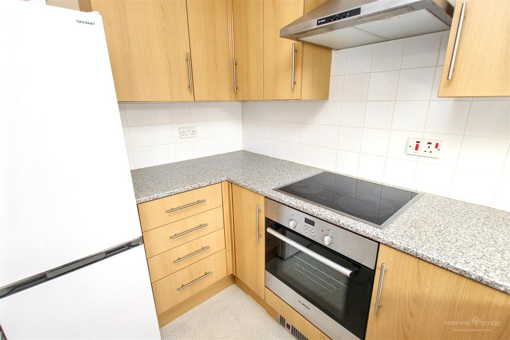 Property photo 3 of 8 Kitchen