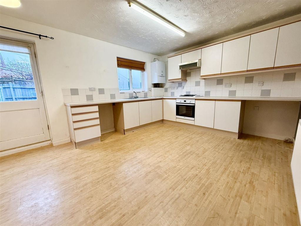 Property photo 2 of 12 Kitchen Dining