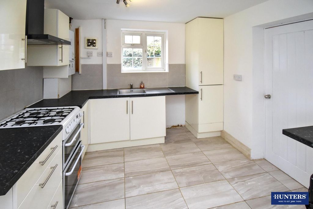 Property photo 3 of 13 Kitchen