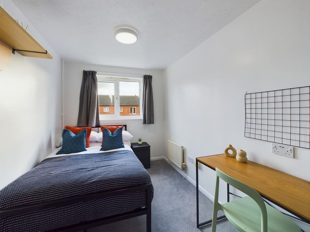 Property photo 3 of 23 A Bright And Inviting Double Bedroom Featuring Mod...