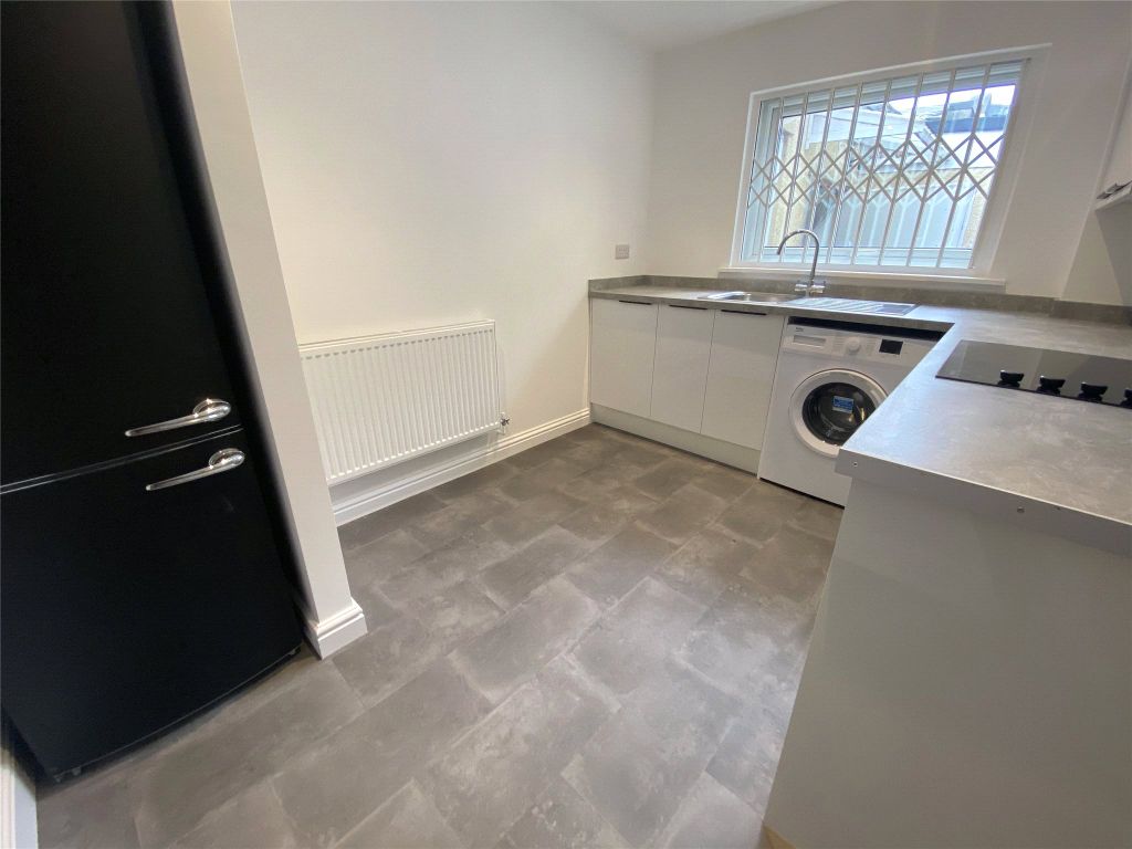 Property photo 3 of 8 Kitchen