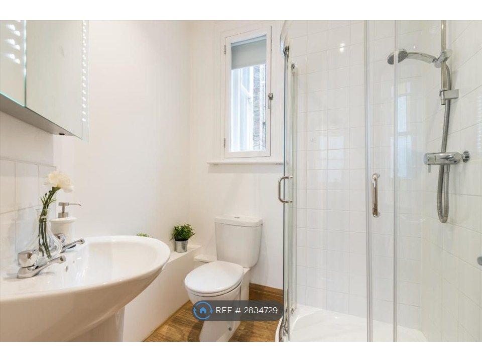 Property photo 3 of 6 Clean And Modern Bathroom With Walk-In Shower