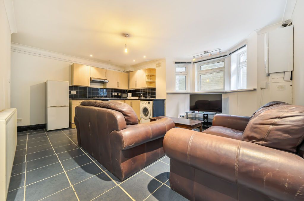 Property photo 2 of 12 Lounge And Kitchen Angle 1