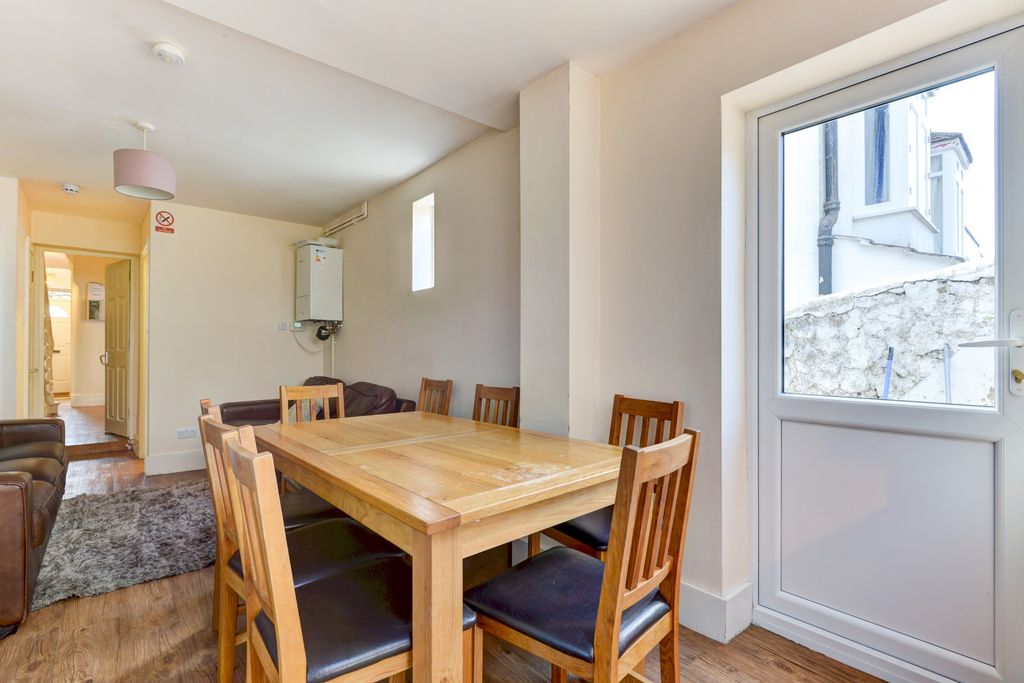 Property photo 2 of 14 A Bright And Spacious Living Room Featuring A Larg...