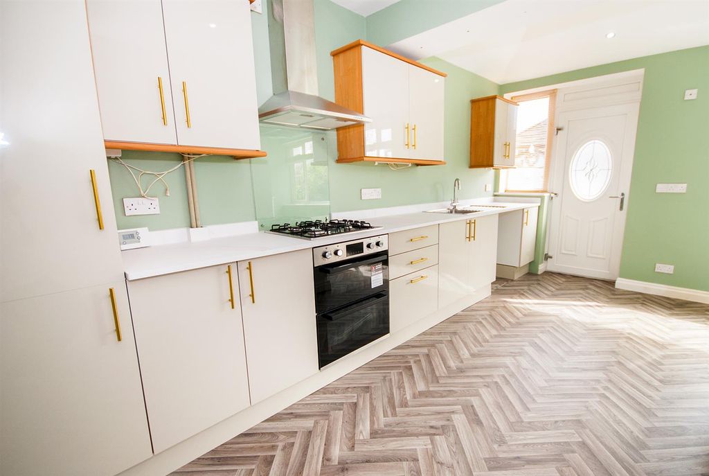 Property photo 2 of 14 Kitchen Area