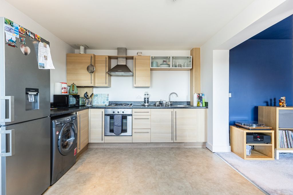 Property photo 3 of 13 Kitchen