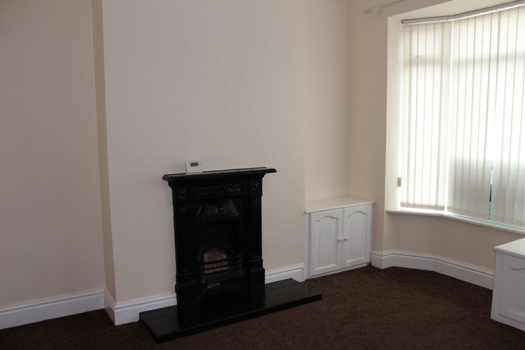 Property photo 3 of 12 Front Room