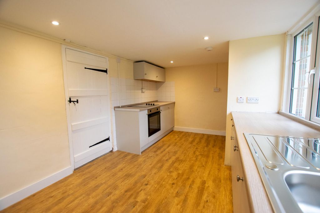 Property photo 3 of 12 Kitchen