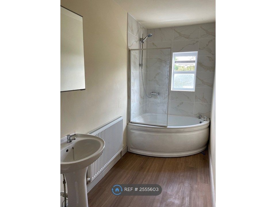 Property photo 2 of 13 Bathroom With Newly Tiled Bath/Shower