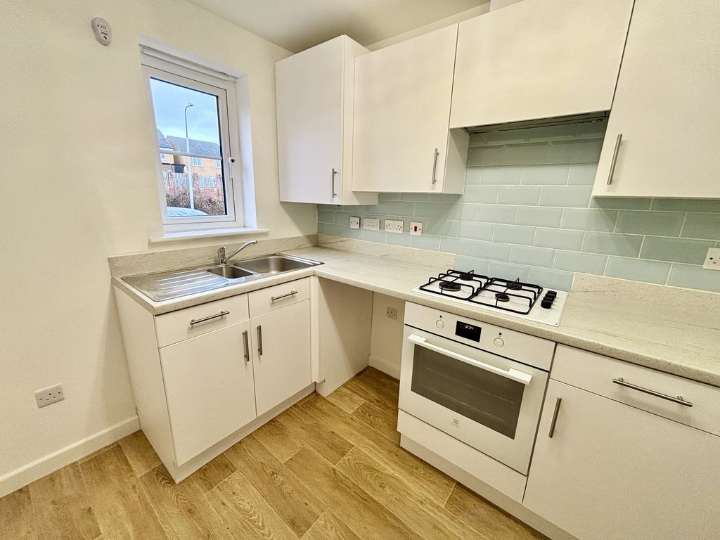 Property photo 3 of 12 Kitchen