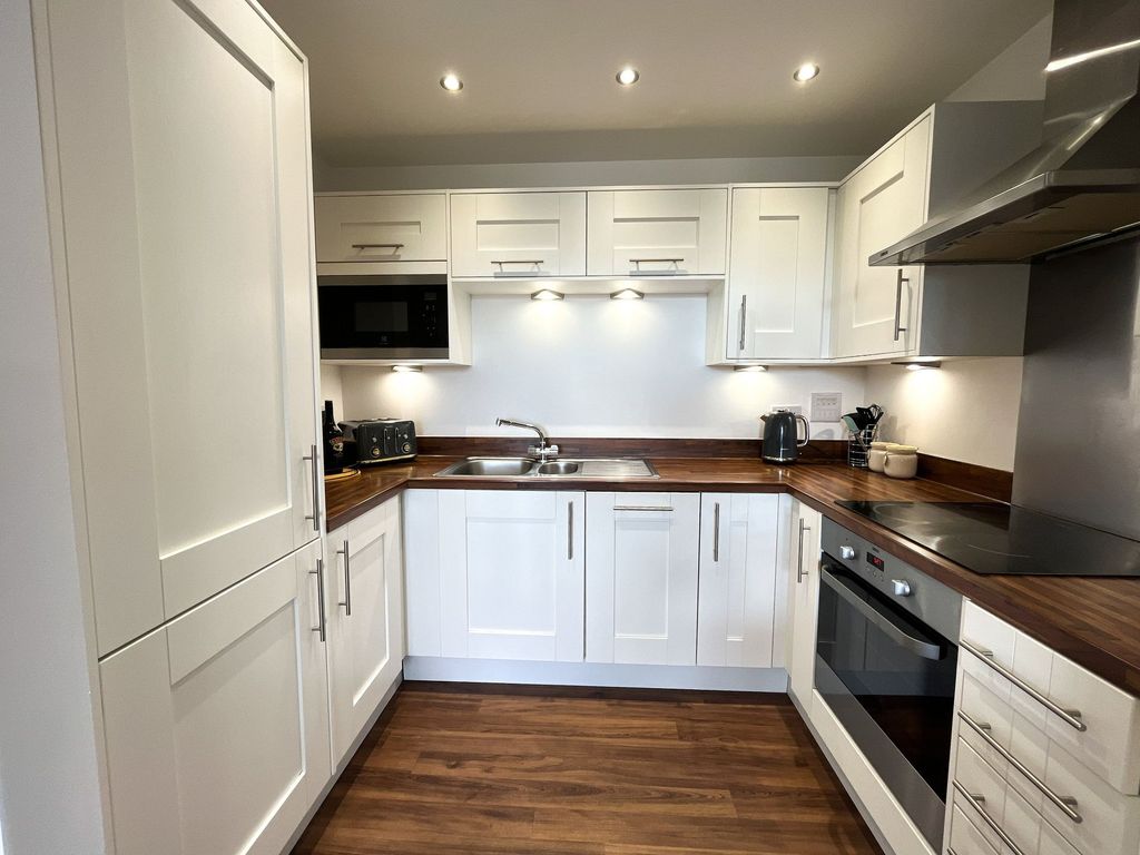 Property photo 2 of 12 Kitchen