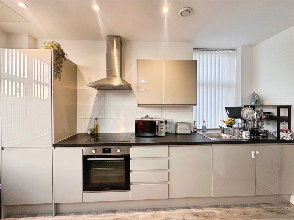 Property photo 2 of 7 Kitchen