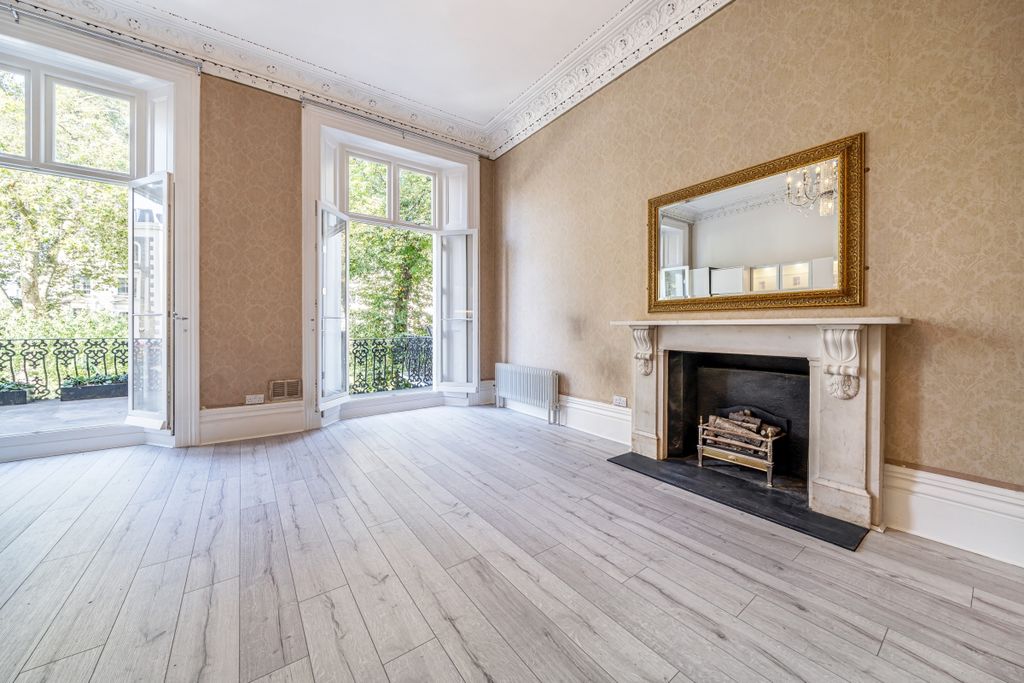 Property photo 2 of 8 Living Room