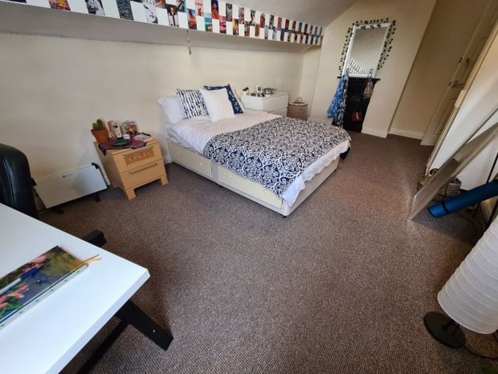Property photo 2 of 22 A Spacious And Well-Maintained Bedroom Featuring A...