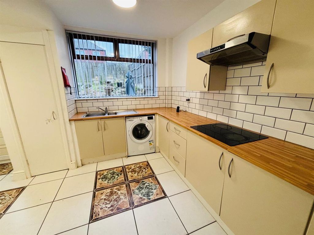 Property photo 3 of 13 Breakfast Kitchen:
