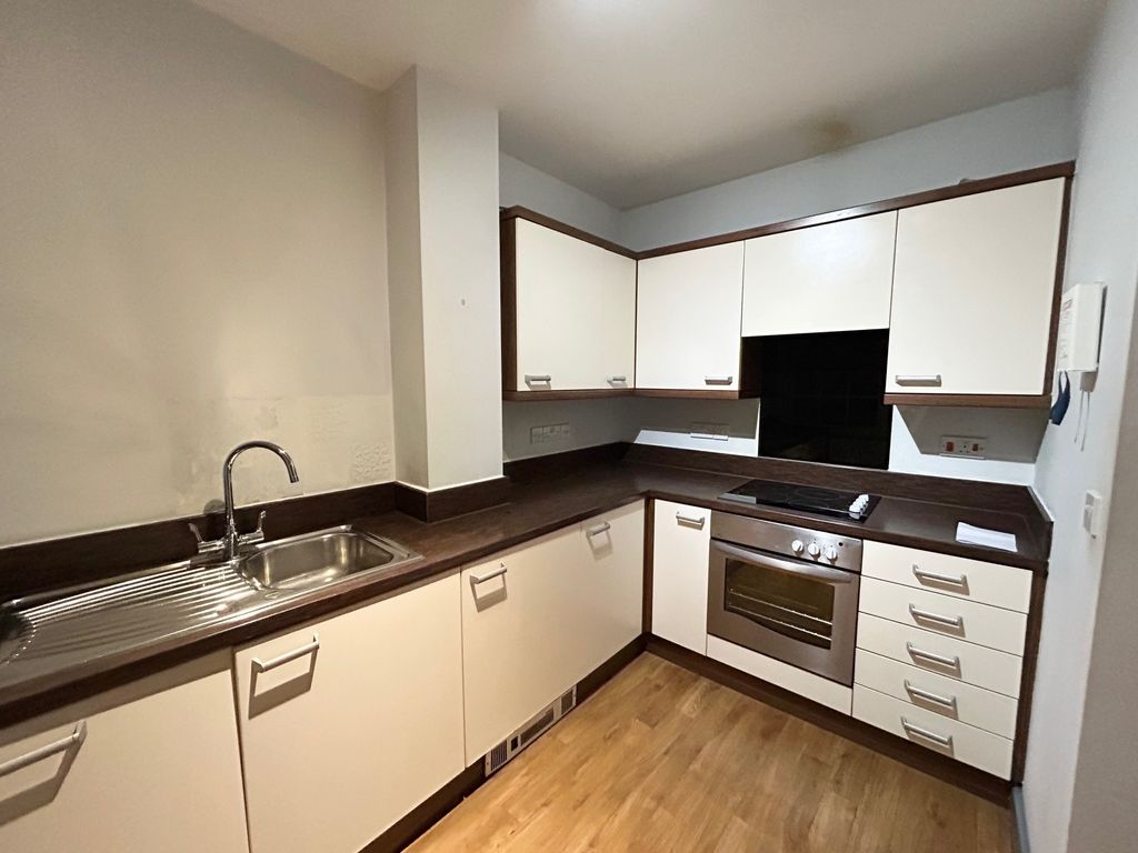 Property photo 2 of 12 Kitchen