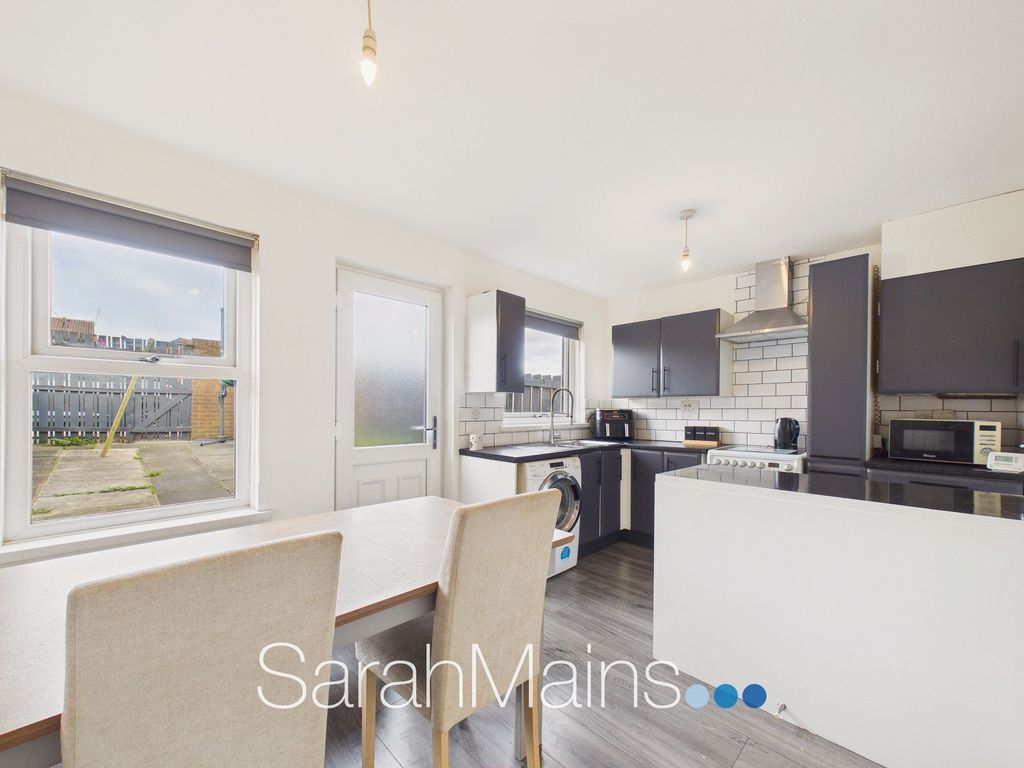 Property photo 2 of 12 Dining Kitchen