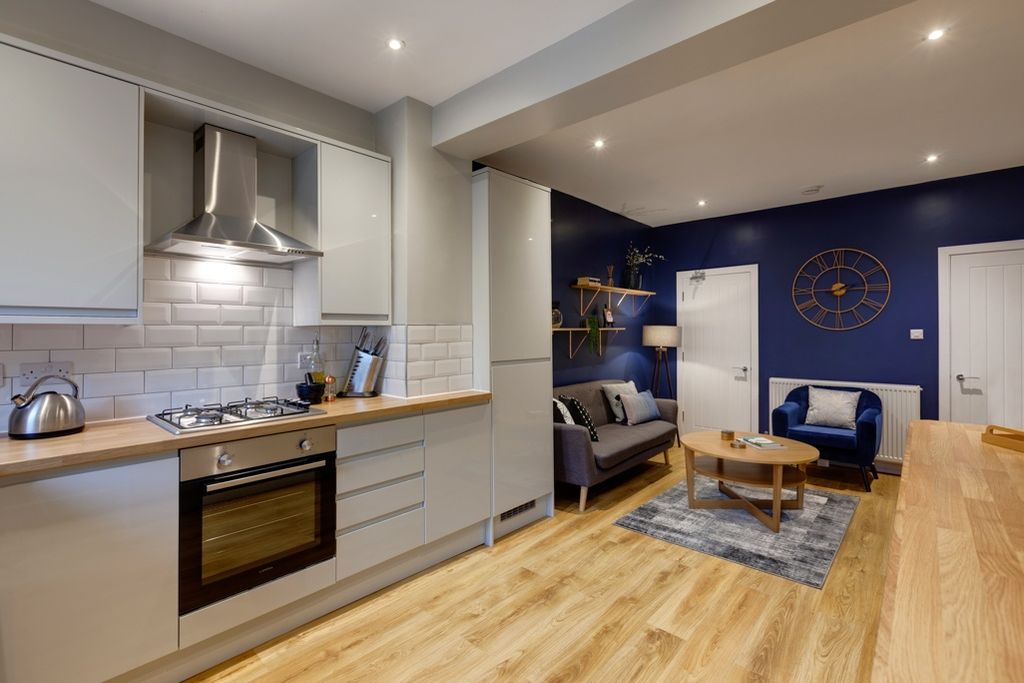 Property photo 3 of 27 Stylish Open-Plan Kitchen And Living Area With Mod...