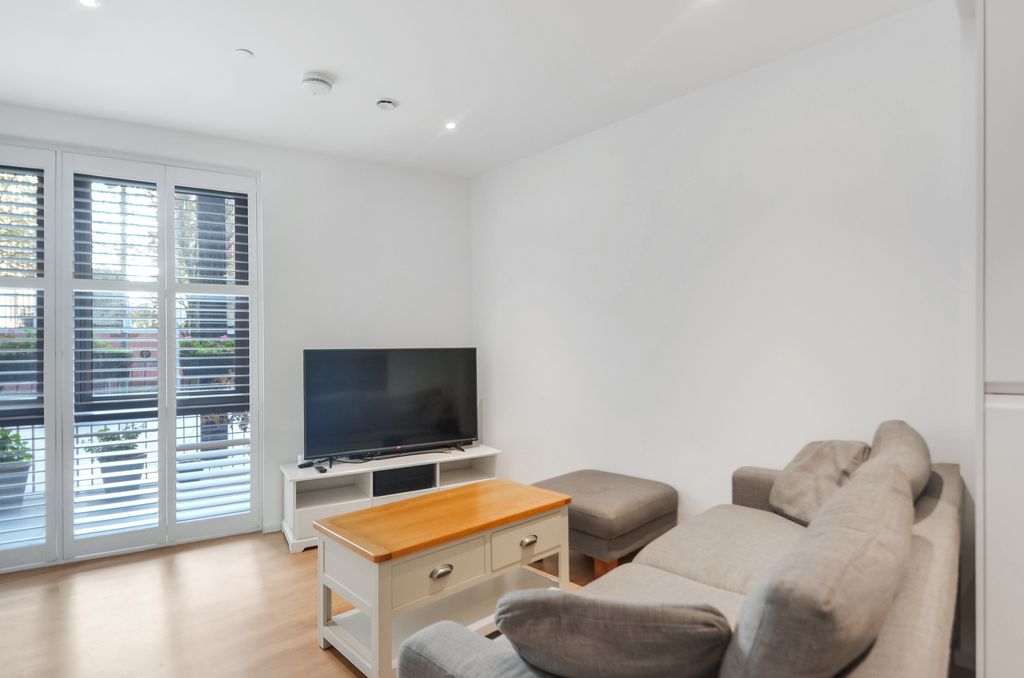 Property photo 2 of 28 Lounge Area (2).Jpg