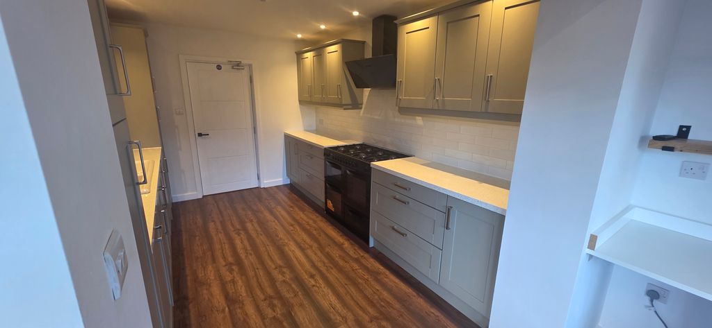 Property photo 3 of 12 Front