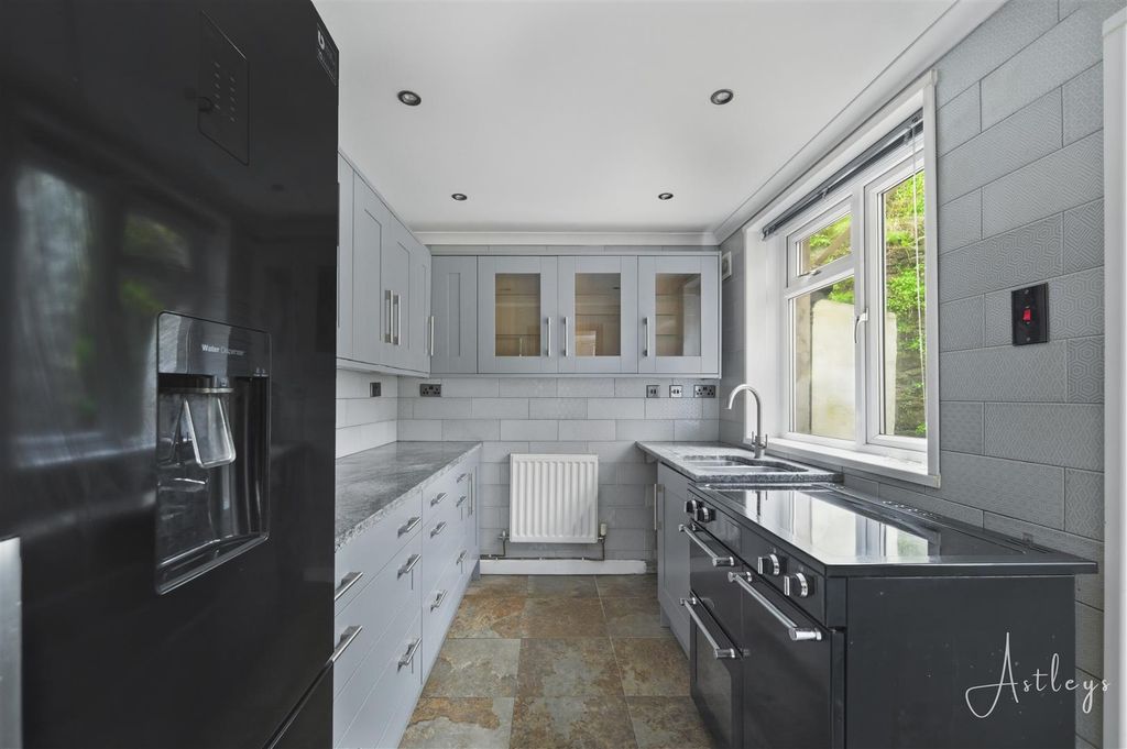 Property photo 3 of 12 Kitchen