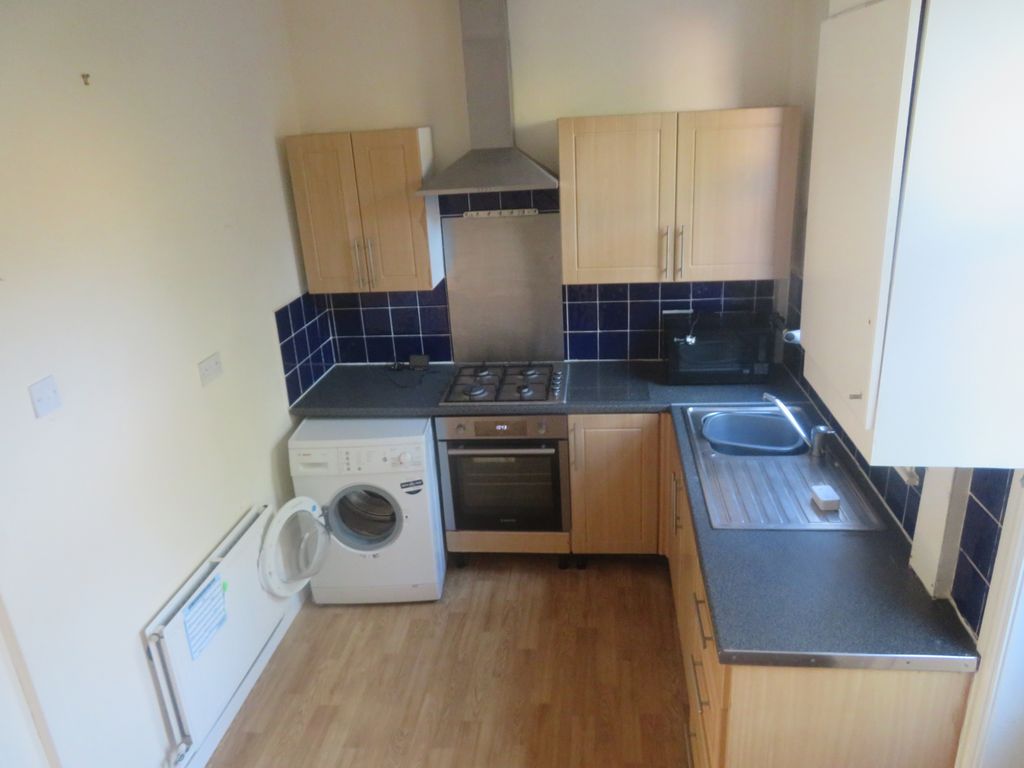 Property photo 3 of 7 Kitchen