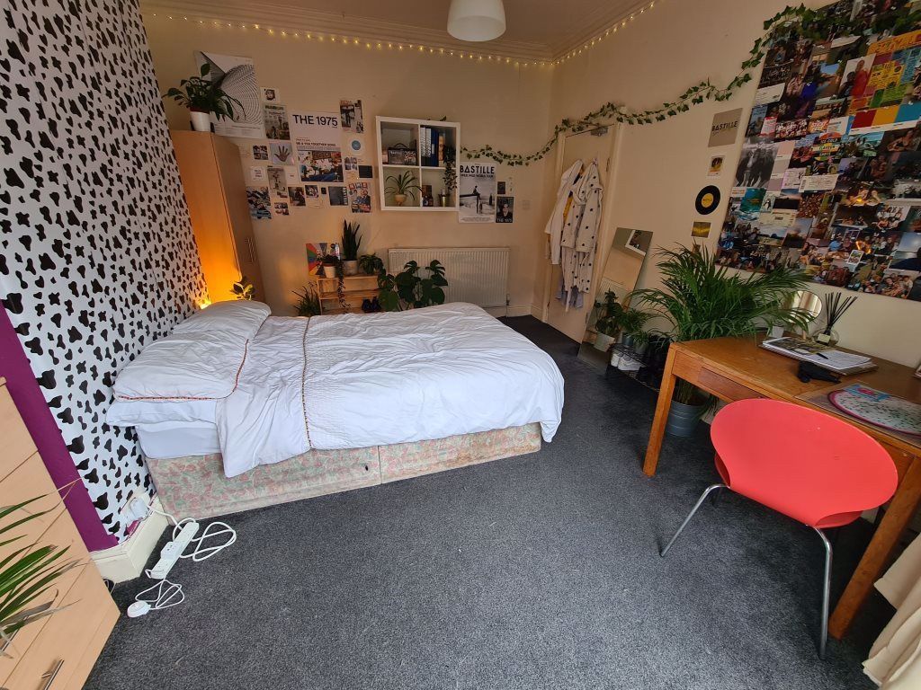 Property photo 2 of 37 A Well-Lit, Inviting Master Bedroom Featuring A Co...